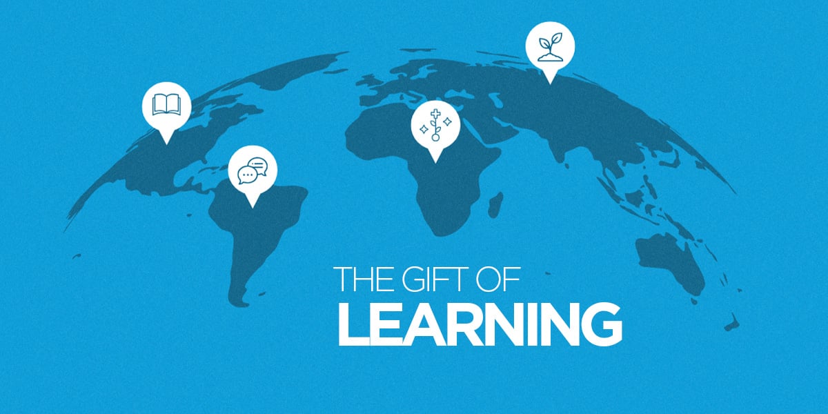 Blue world map. "the gift of learning."